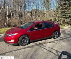 2013 Chevrolet Volt (hybrid) with 111k miles in good condition